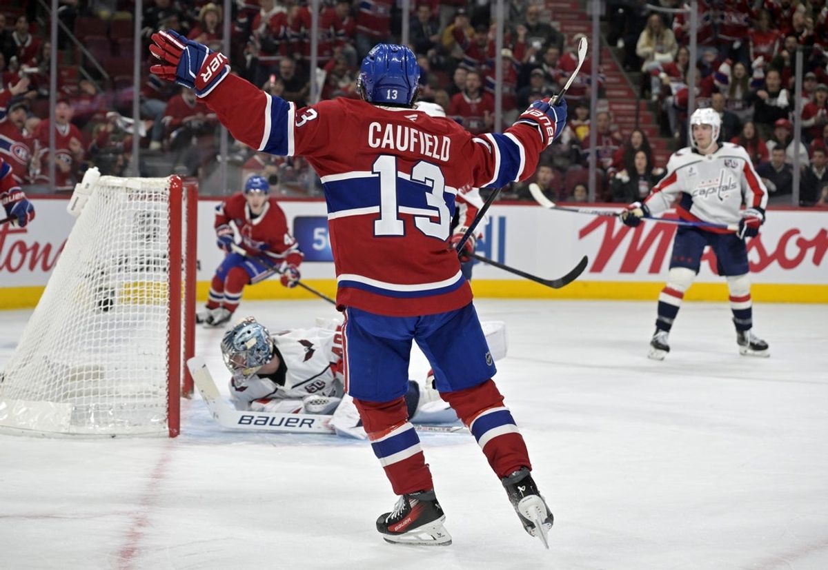 Apr 25, 2025; Montreal, Quebec, CAN; Montreal Canadiens forward Cole Caufield (13) celebrates after scoring a goal against Washington Capitals goalie Logan Thompson (48) during the second period in game three of the first round of the 2025 Stanley Cup Playoffs at the Bell Centre. Mandatory Credit: Eric Bolte-Imagn Images