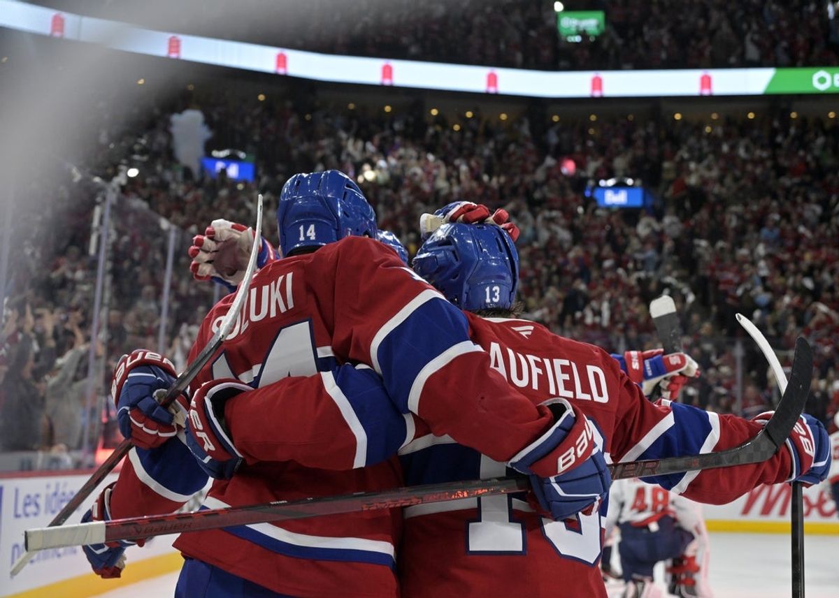 Apr 25, 2025; Montreal, Quebec, CAN; Montreal Canadiens forward Cole Caufield (13) celebrates with teammates after scoring a goal against the Washington Capitals during the second period in game three of the first round of the 2025 Stanley Cup Playoffs at the Bell Centre. Mandatory Credit: Eric Bolte-Imagn Images