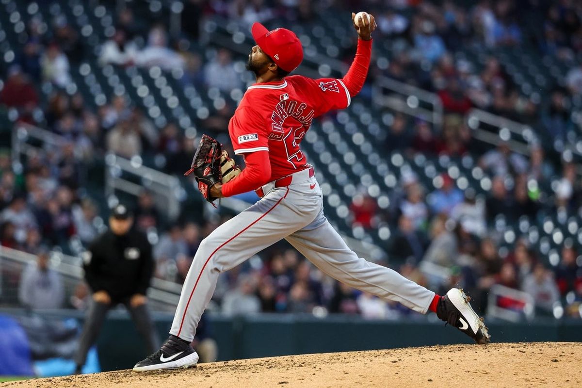 Apr 25, 2025; Minneapolis, Minnesota, USA; Los Angeles Angels pitcher Carl Edwards Jr. (52) delivers a pitch against the Minnesota Twins during the fourth inning at Target Field. Mandatory Credit: Matt Krohn-Imagn Images
