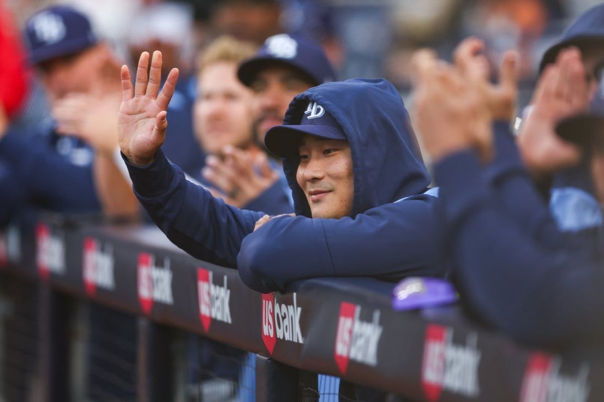 Apr 25, 2025; San Diego, California, USA; Tampa Bay Rays shortstop Ha Seong Kim (7) waves to the crowd after being recognized during the first inning against the San Diego Padres at Petco Park. Mandatory Credit: Chadd Cady-Imagn Images