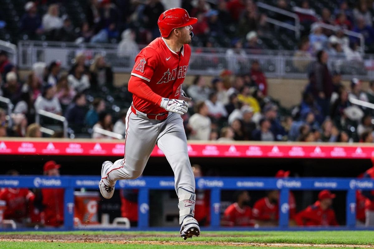 Apr 25, 2025; Minneapolis, Minnesota, USA; Los Angeles Angels designated hitter Mike Trout (27) watches his solo home run against the Minnesota Twins during the seventh inning at Target Field. Mandatory Credit: Matt Krohn-Imagn Images