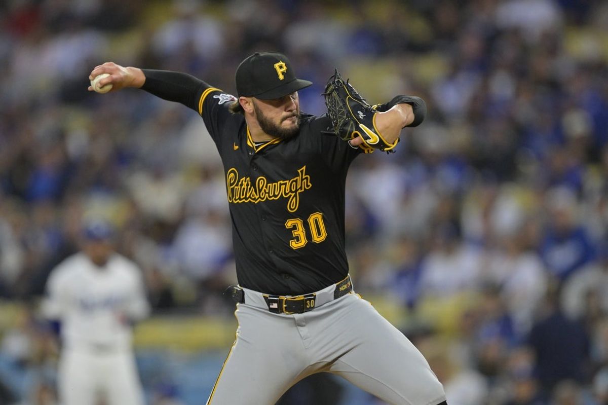Apr 25, 2025; Los Angeles, California, USA;  Pittsburgh Pirates starting pitcher Paul Skenes (30) pitches during the first inning against the Los Angeles Dodgers at Dodger Stadium. Mandatory Credit: Jayne Kamin-Oncea-Imagn Images