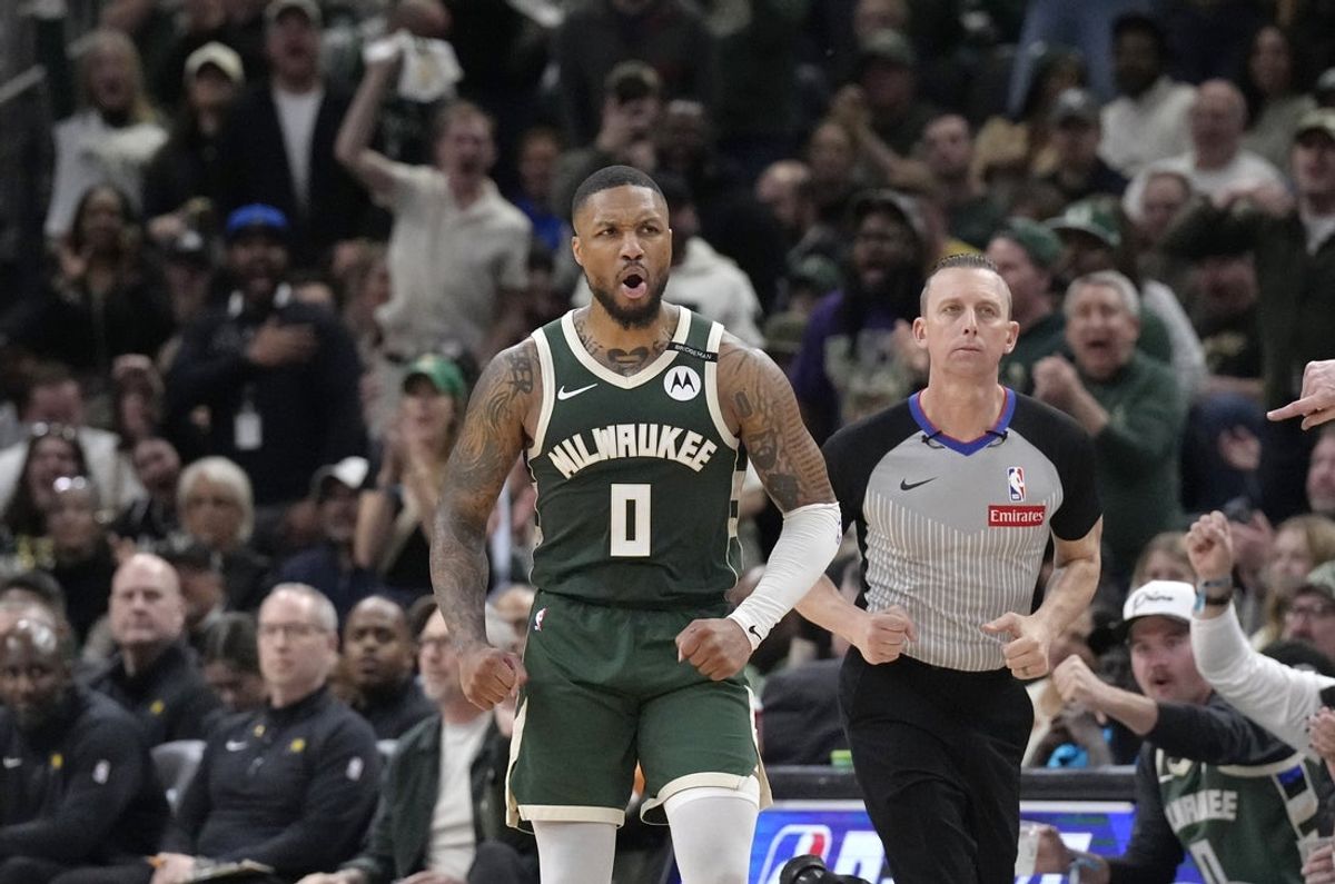 Apr 25, 2025; Milwaukee, Wisconsin, USA; Milwaukee Bucks guard Damian Lillard (0) reacts after making a basket against the Indiana Pacers in the second half during game three of first round for the 2024 NBA Playoffs at Fiserv Forum. Mandatory Credit: Michael McLoone-Imagn Images