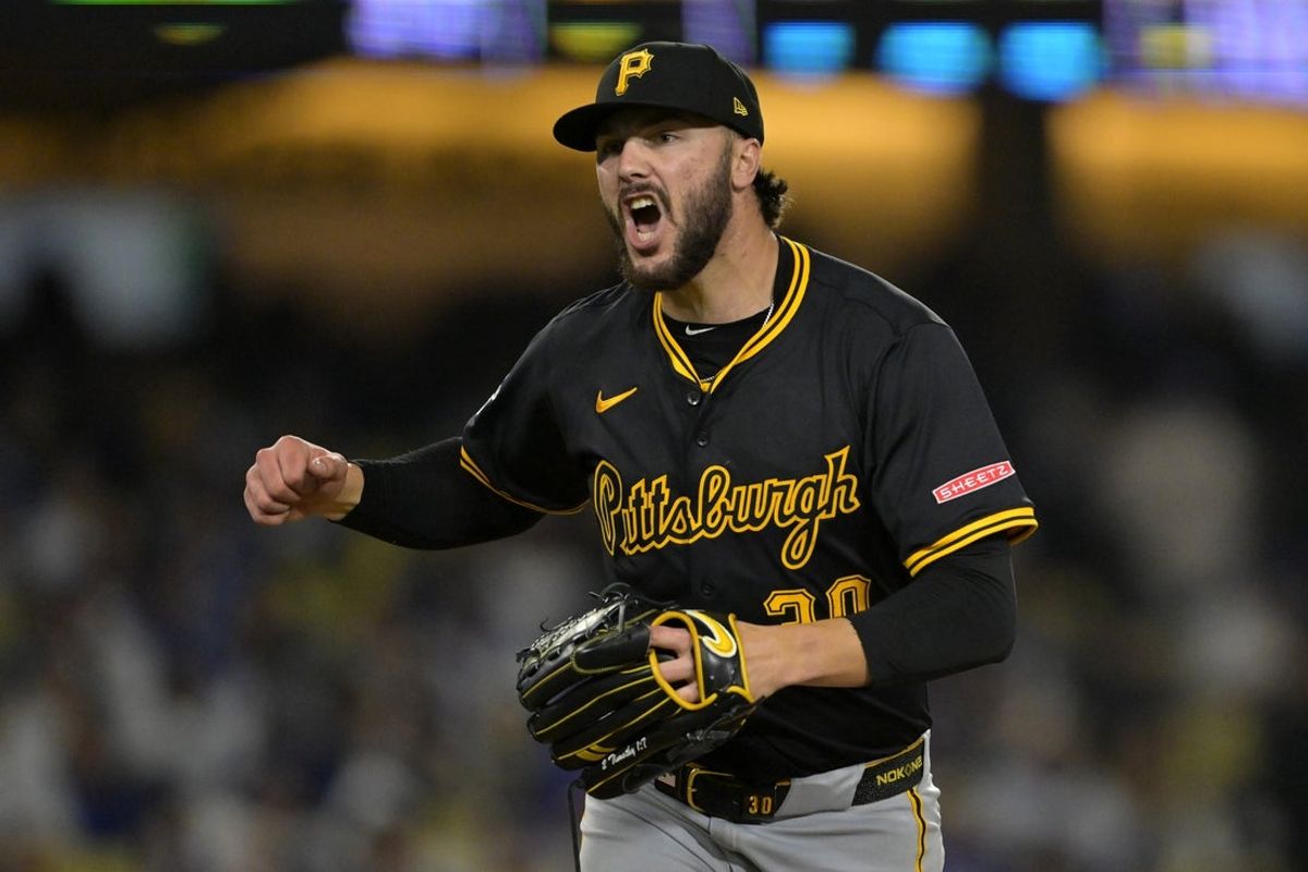 Apr 25, 2025; Los Angeles, California, USA;  Pittsburgh Pirates starting pitcher Paul Skenes (30) reacts after striking out Los Angeles Dodgers second baseman Tommy Edman (25) to end the sixth inning at Dodger Stadium. Mandatory Credit: Jayne Kamin-Oncea-Imagn Images