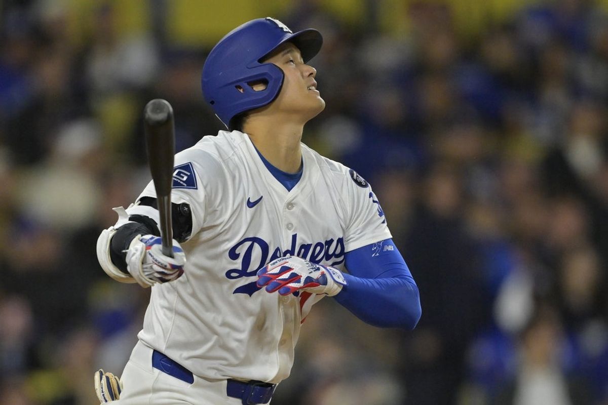 Apr 25, 2025; Los Angeles, California, USA;  Los Angeles Dodgers designated hitter Shohei Ohtani (17) flies out in the eighth inning against the Pittsburgh Pirates at Dodger Stadium. Mandatory Credit: Jayne Kamin-Oncea-Imagn Images