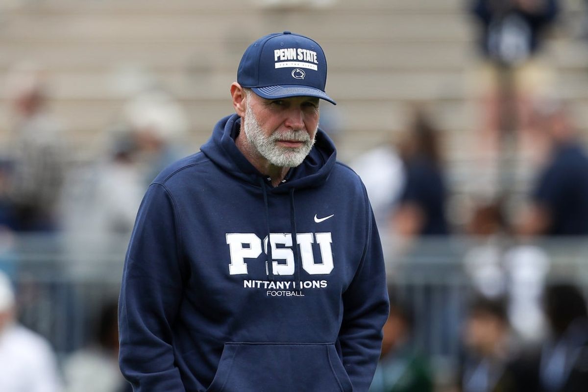 Apr 26, 2025; University Park, PA, USA; Penn State Nittany Lions defensive coordinator Jim Knowles walks on the field prior to the Blue White spring game at Beaver Stadium. Mandatory Credit: Matthew O'Haren-Imagn Images