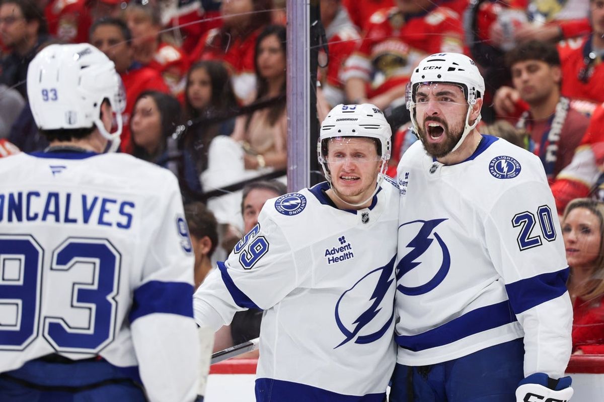 Apr 26, 2025; Sunrise, Florida, USA; Tampa Bay Lightning left wing Nick Paul (20) celebrates with center Jake Guentzel (59) after scoring a goal against the Florida Panthers in the second period during game three of the first round of the 2025 Stanley Cup Playoffs at Amerant Bank Arena. Mandatory Credit: Nathan Ray Seebeck-Imagn Images