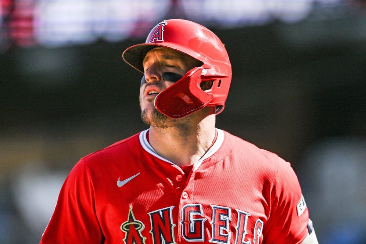 Apr 26, 2025; Minneapolis, Minnesota, USA; Los Angeles Angels outfielder Mike Trout (27) reacts after lining out during the ninth inning against the Minnesota Twins at Target Field. Mandatory Credit: Jeffrey Becker-Imagn Images