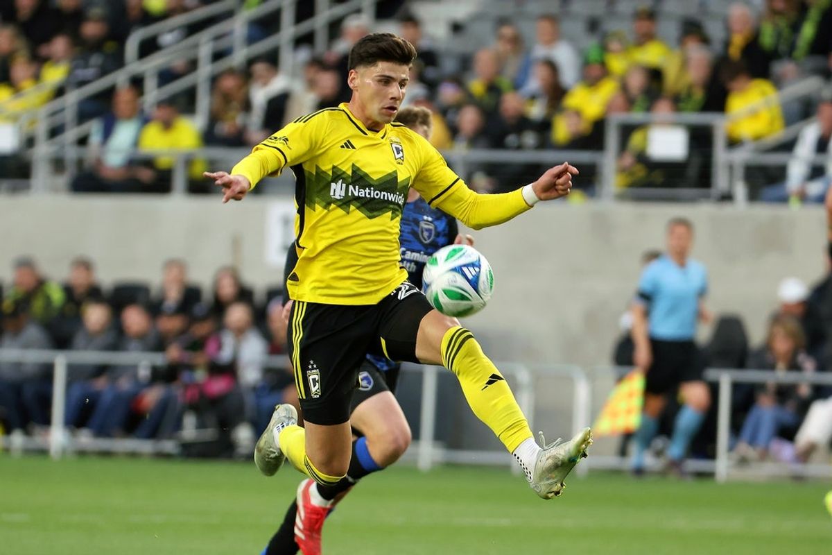 Apr 26, 2025; Columbus, Ohio, USA;  Columbus Crew forward Max Arfsten (27) gathers a pass during the first half against the San Jose Earthquakes at Lower.com Field. Mandatory Credit: Joseph Maiorana-Imagn Images