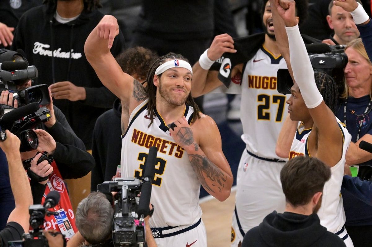 Apr 26, 2025; Inglewood, California, USA; Denver Nuggets forward Aaron Gordon (32) celebrates after the game winning dunk to defeat the Los Angeles Clippers 101-99 in game four of round one of the 2024 NBA Playoffs at Intuit Dome. Mandatory Credit: Jayne Kamin-Oncea-Imagn Images