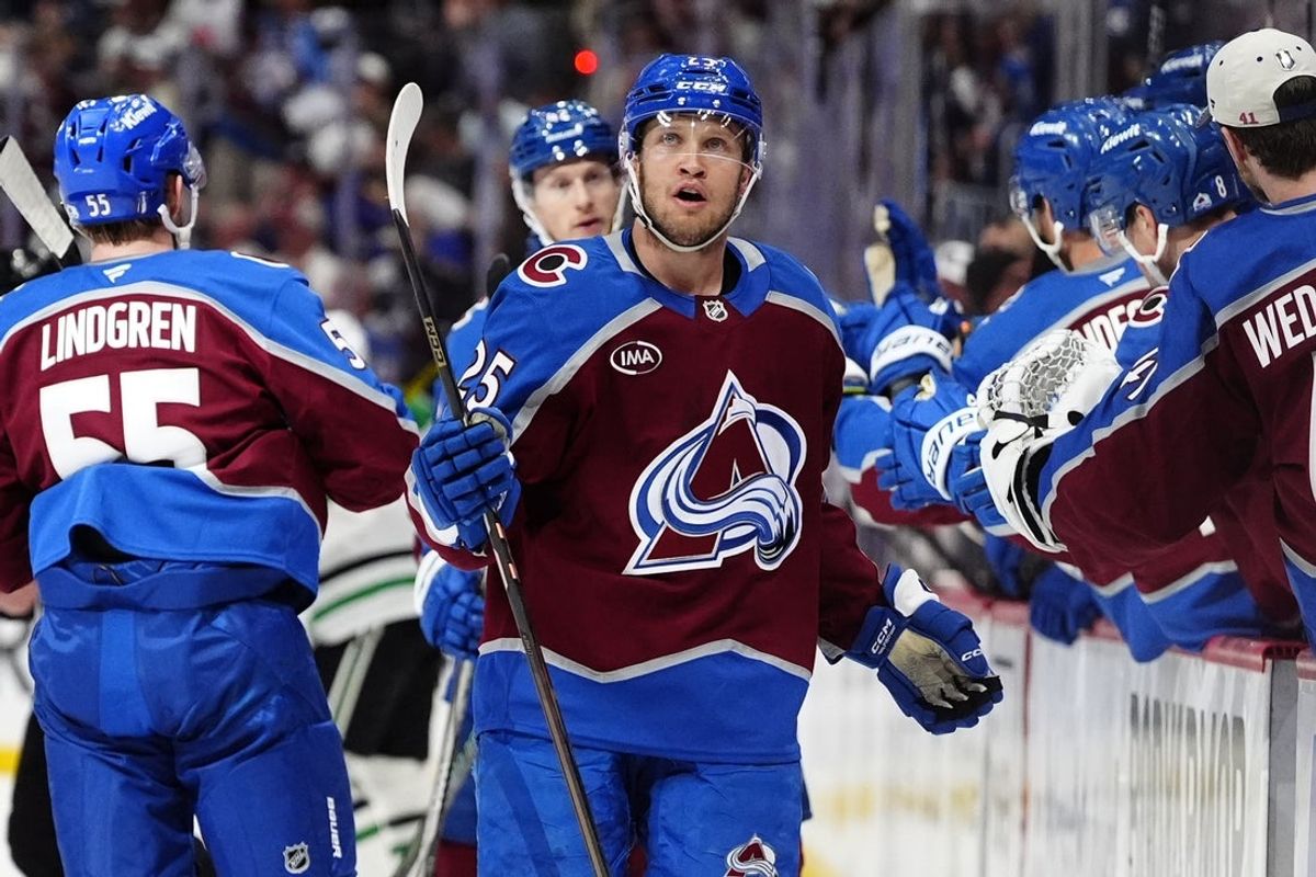 Mar 25, 2025; Denver, Colorado, USA; Colorado Avalanche right wing Logan O'Connor (25) celebrates his short handed goal in the first period against the Dallas Stars at Ball Arena. Mandatory Credit: Ron Chenoy-Imagn Images