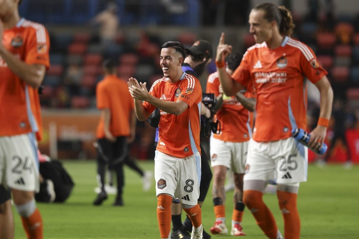 Apr 26, 2025; Houston, Texas, USA; Houston Dynamo FC midfielder Amine Bassi (8) claps after the match against Austin FC at Shell Energy Stadium. Mandatory Credit: Troy Taormina-Imagn Images