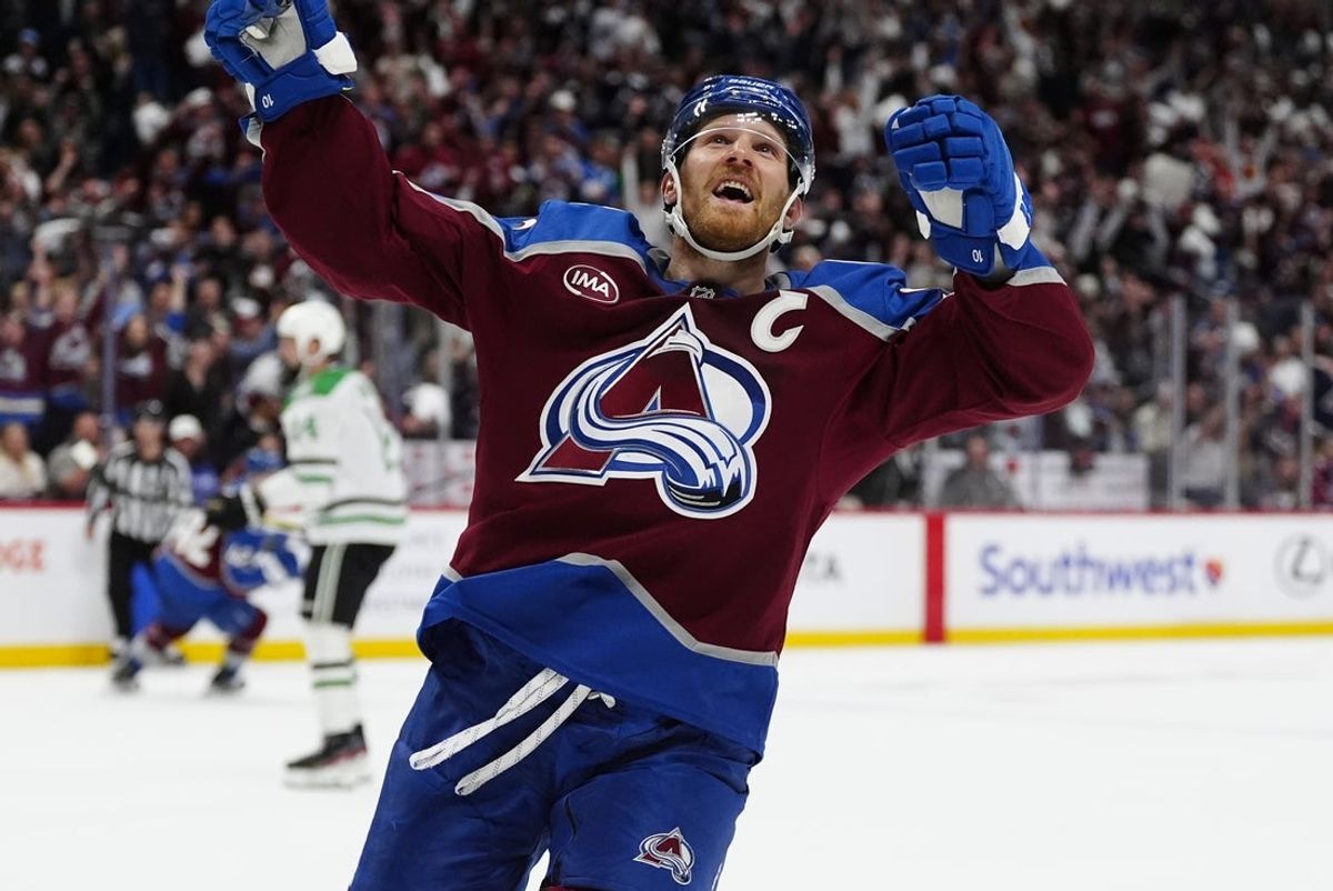Mar 25, 2025; Denver, Colorado, USA; Colorado Avalanche left wing Gabriel Landeskog (92) celebrates his goal in the second period against the Dallas Stars at Ball Arena. Mandatory Credit: Ron Chenoy-Imagn Images