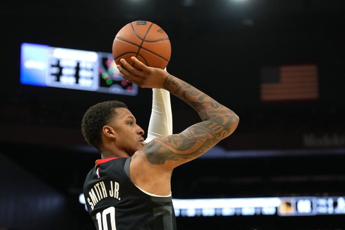 Apr 26, 2025; San Francisco, California, USA; Houston Rockets forward Jabari Smith Jr. (10) shoots against the Golden State Warriors during the third quarter of game three of first round for the 2024 NBA Playoffs at Chase Center. Mandatory Credit: Darren Yamashita-Imagn Images