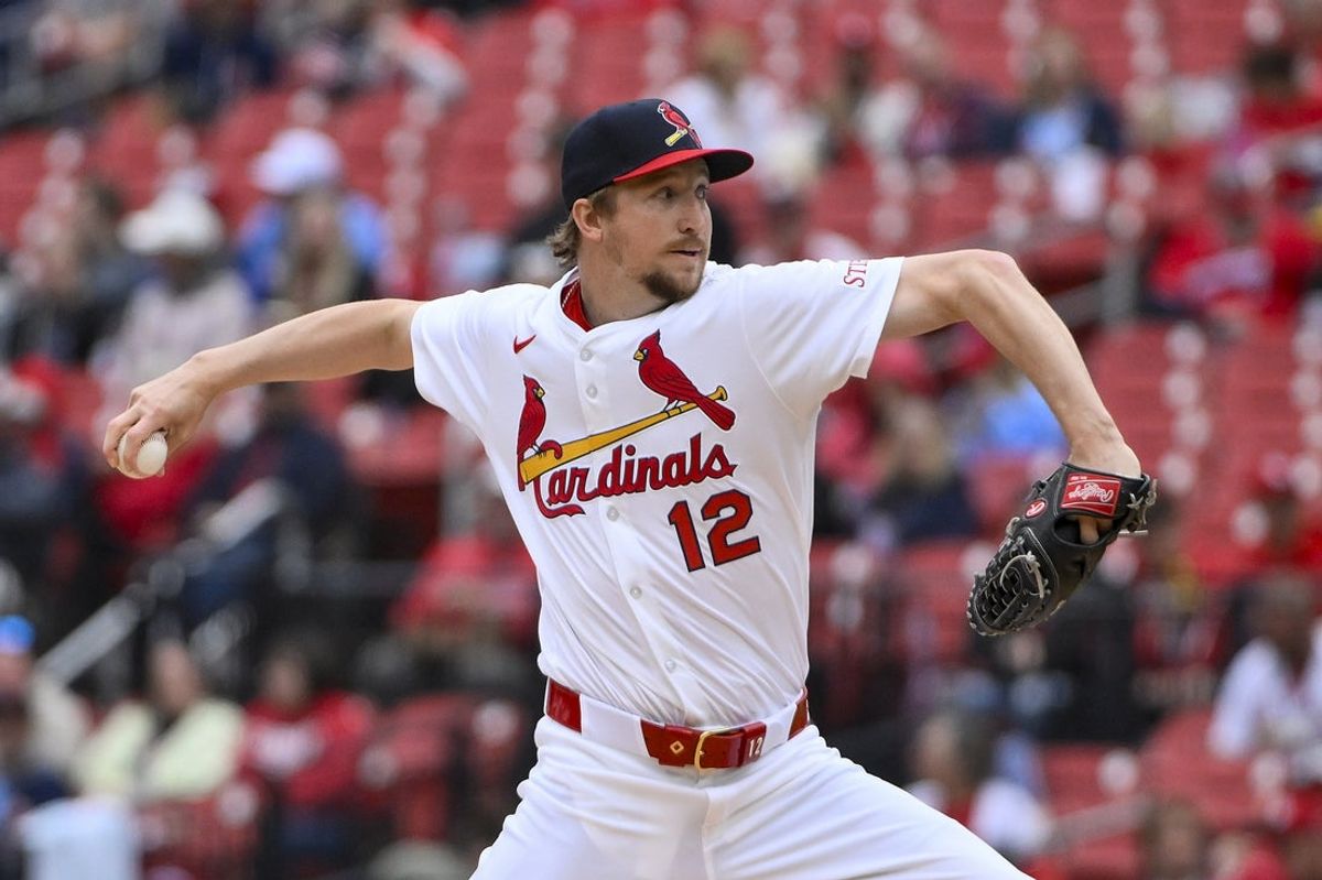 Apr 27, 2025; St. Louis, Missouri, USA;  St. Louis Cardinals starting pitcher Erick Fedde (12) pitches against the Milwaukee Brewers during the first inning at Busch Stadium. Mandatory Credit: Jeff Curry-Imagn Images
