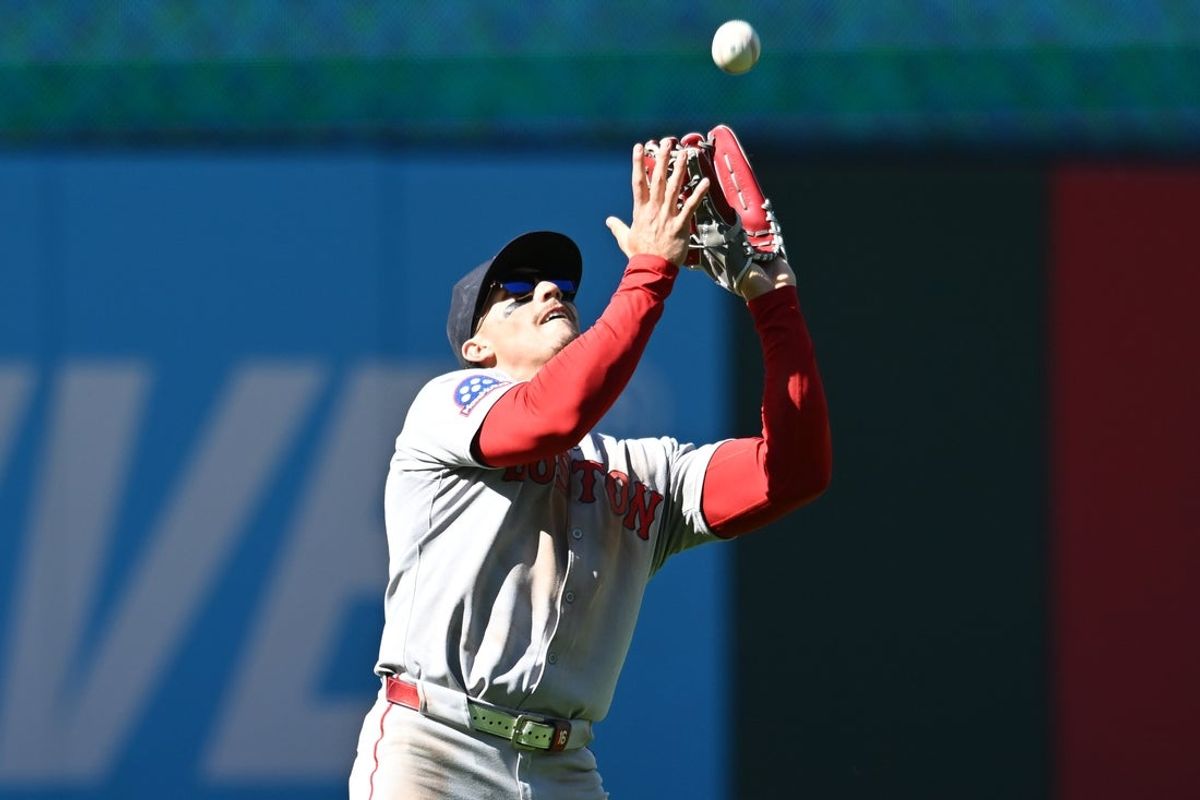 Apr 27, 2025; Cleveland, Ohio, USA; Boston Red Sox left fielder Jarren Duran (16) catches a ball hit by Cleveland Guardians center fielder Angel Martinez (not pictured) during the ninth inning at Progressive Field. Mandatory Credit: Ken Blaze-Imagn Images