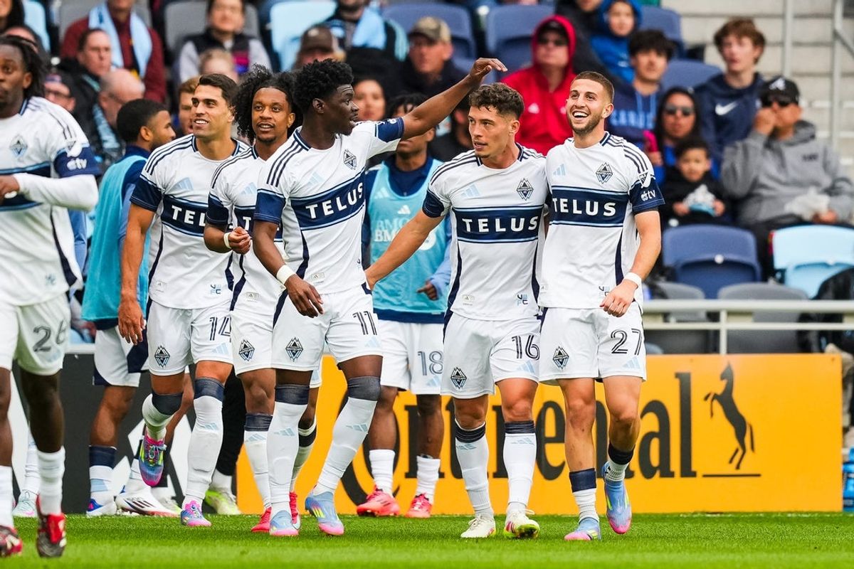 Apr 27, 2025; Saint Paul, Minnesota, USA; Vancouver Whitecaps midfielder Sebastian Berhalter (16) celebrates his goal with teammates during the second half against Minnesota United at Allianz Field. Mandatory Credit: Brace Hemmelgarn-Imagn Images
