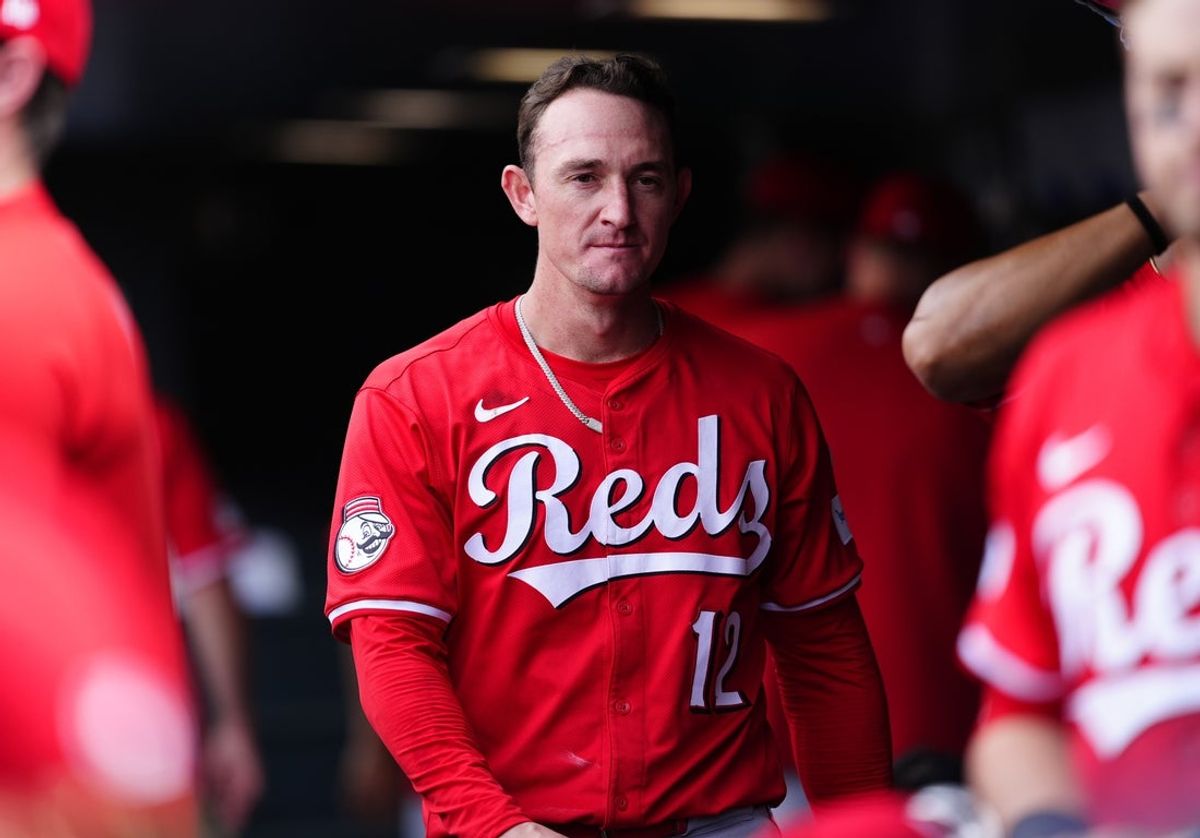 Apr 27, 2025; Denver, Colorado, USA; Cincinnati Reds left fielder Austin Hays (12) during the ninth inning against the Colorado Rockies at Coors Field. Mandatory Credit: Ron Chenoy-Imagn Images