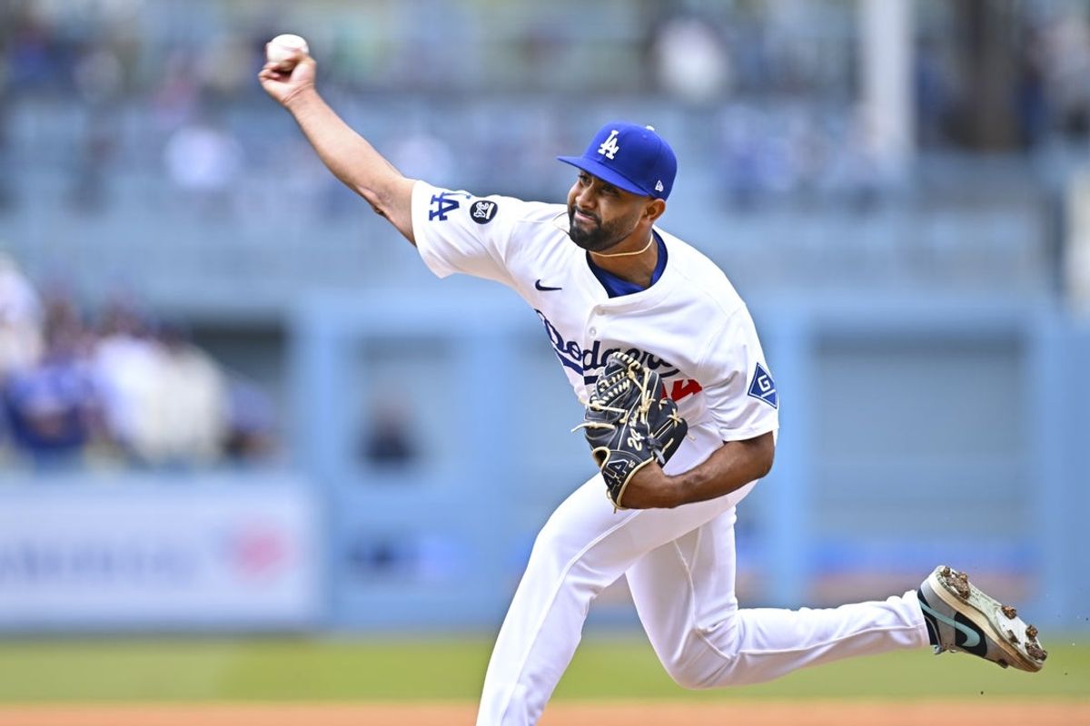 Apr 27, 2025; Los Angeles, California, USA; Los Angeles Dodgers pitcher Yoendrys Gomez (94) throws a pitch against the Pittsburgh Pirates during the ninth inning at Dodger Stadium. Mandatory Credit: Jonathan Hui-Imagn Images