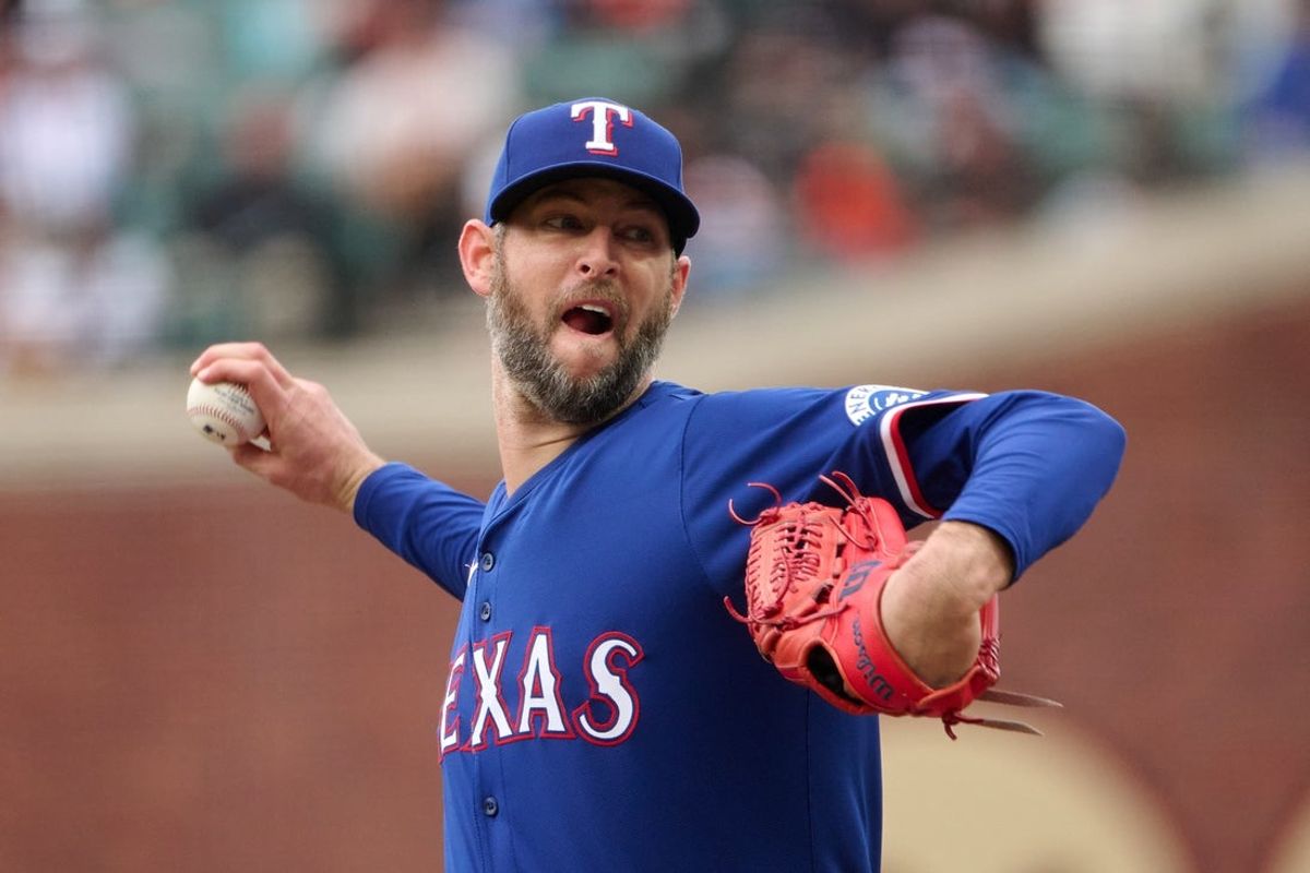 Apr 27, 2025; San Francisco, California, USA; Texas Rangers pitcher Chris Martin (55) throws a pitch against the San Francisco Giants during the eighth inning at Oracle Park. Mandatory Credit: Robert Edwards-Imagn Images