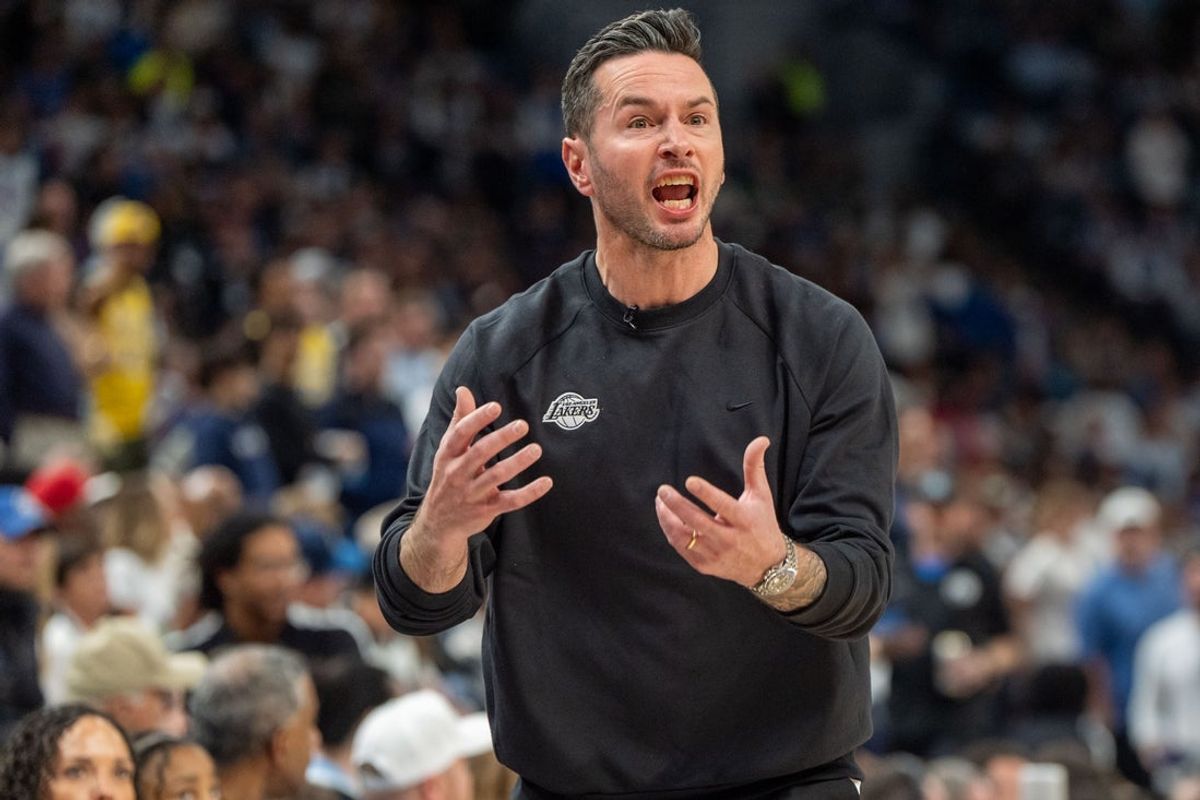 Apr 27, 2025; Minneapolis, Minnesota, USA; Los Angeles Lakers head coach JJ Redick lobbies for possession due to a Minnesota Timberwolves player kicking the ball in the third quarter during game four of first round for the 2025 NBA Playoffs at Target Center. Mandatory Credit: Matt Blewett-Imagn Images