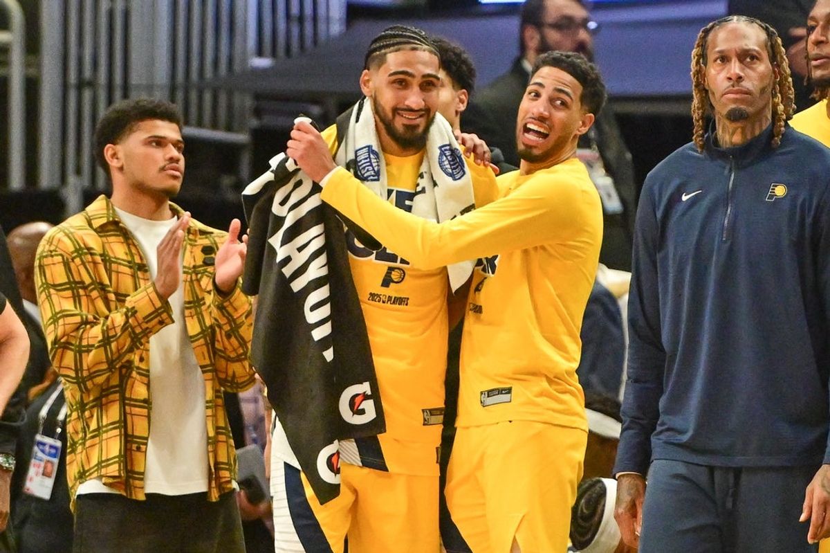 Apr 27, 2025; Milwaukee, Wisconsin, USA; Milwaukee Bucks guard Damian Lillard (0) hugs forward Obi Toppin (1) after the Pacers defeated the Milwaukee Bucks during game four of first round for the 2024 NBA Playoffs at Fiserv Forum. Mandatory Credit: Benny Sieu-Imagn Images