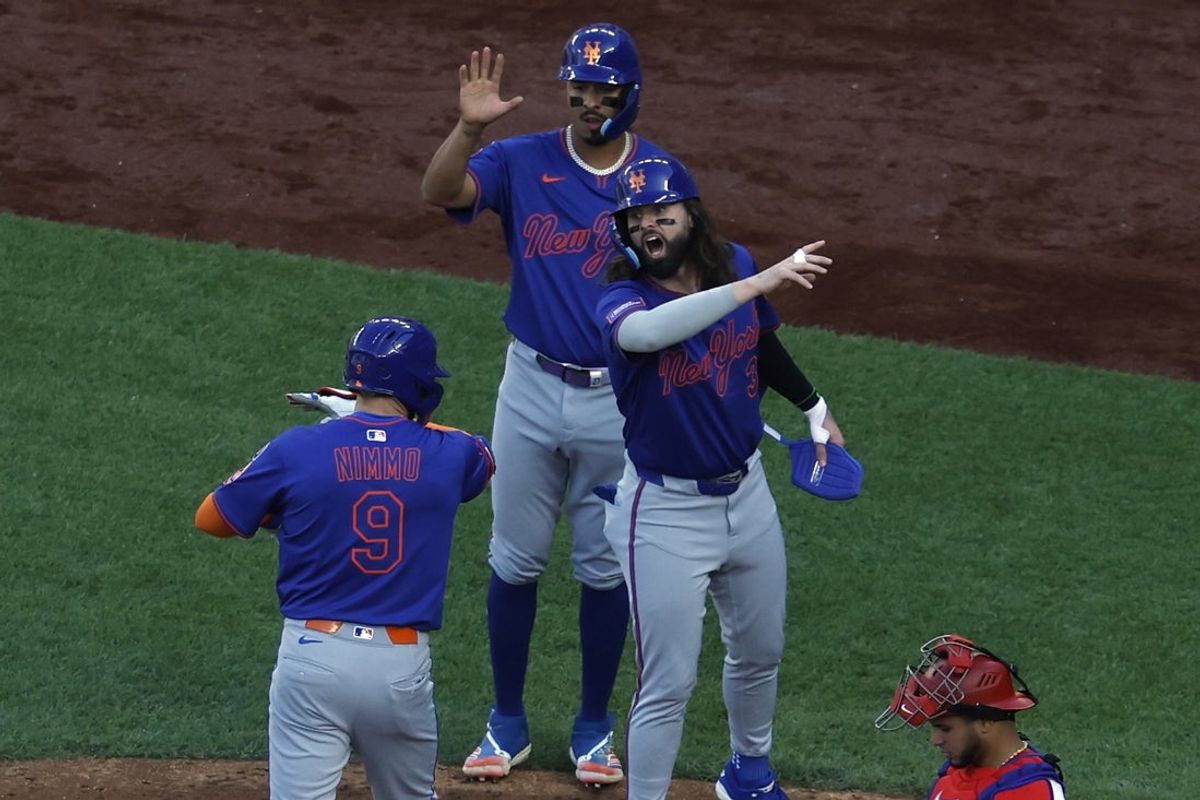 Apr 28, 2025; Washington, District of Columbia, USA; New York Mets outfielder Brandon Nimmo (9) celebrates with Mets outfielder Jesse Winker (3) and Mets third baseman Mark Vientos (27) after hitting a three run home run against the Washington Nationals during the sixth inning at Nationals Park. Mandatory Credit: Geoff Burke-Imagn Images