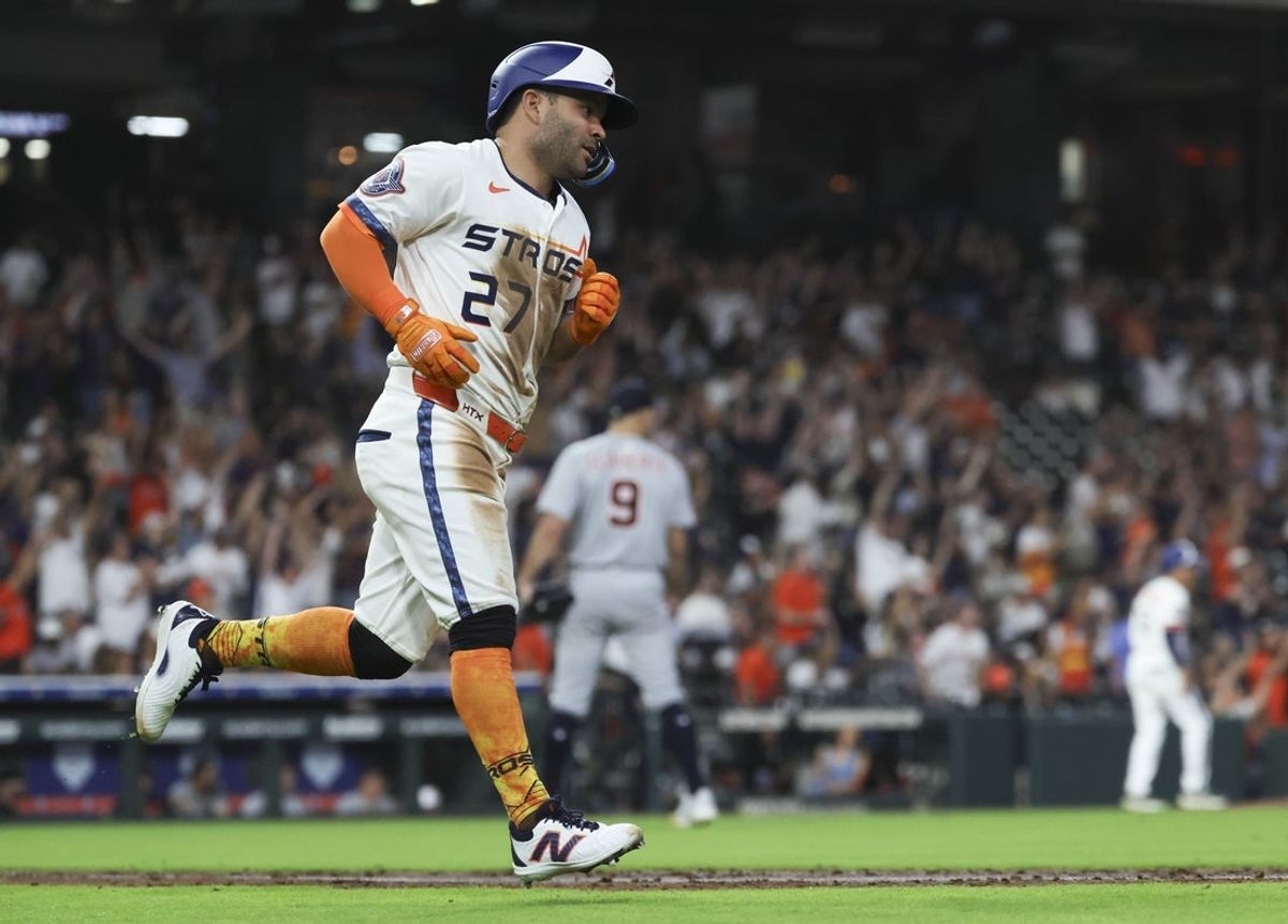 Apr 28, 2025; Houston, Texas, USA; Detroit Tigers starting pitcher Jack Flaherty (9) looks up and Houston Astros left fielder Jose Altuve (27) rounds the bases after hitting a home run during the sixth inning at Daikin Park. Mandatory Credit: Troy Taormina-Imagn Images