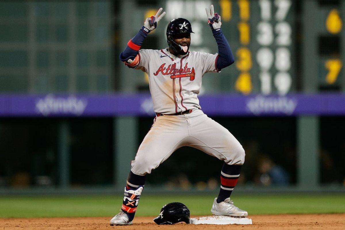 Apr 28, 2025; Denver, Colorado, USA; Atlanta Braves center fielder Michael Harris II (23) reacts from second on a two RBI double in the fifth inning against the Colorado Rockies at Coors Field. Mandatory Credit: Isaiah J. Downing-Imagn Images