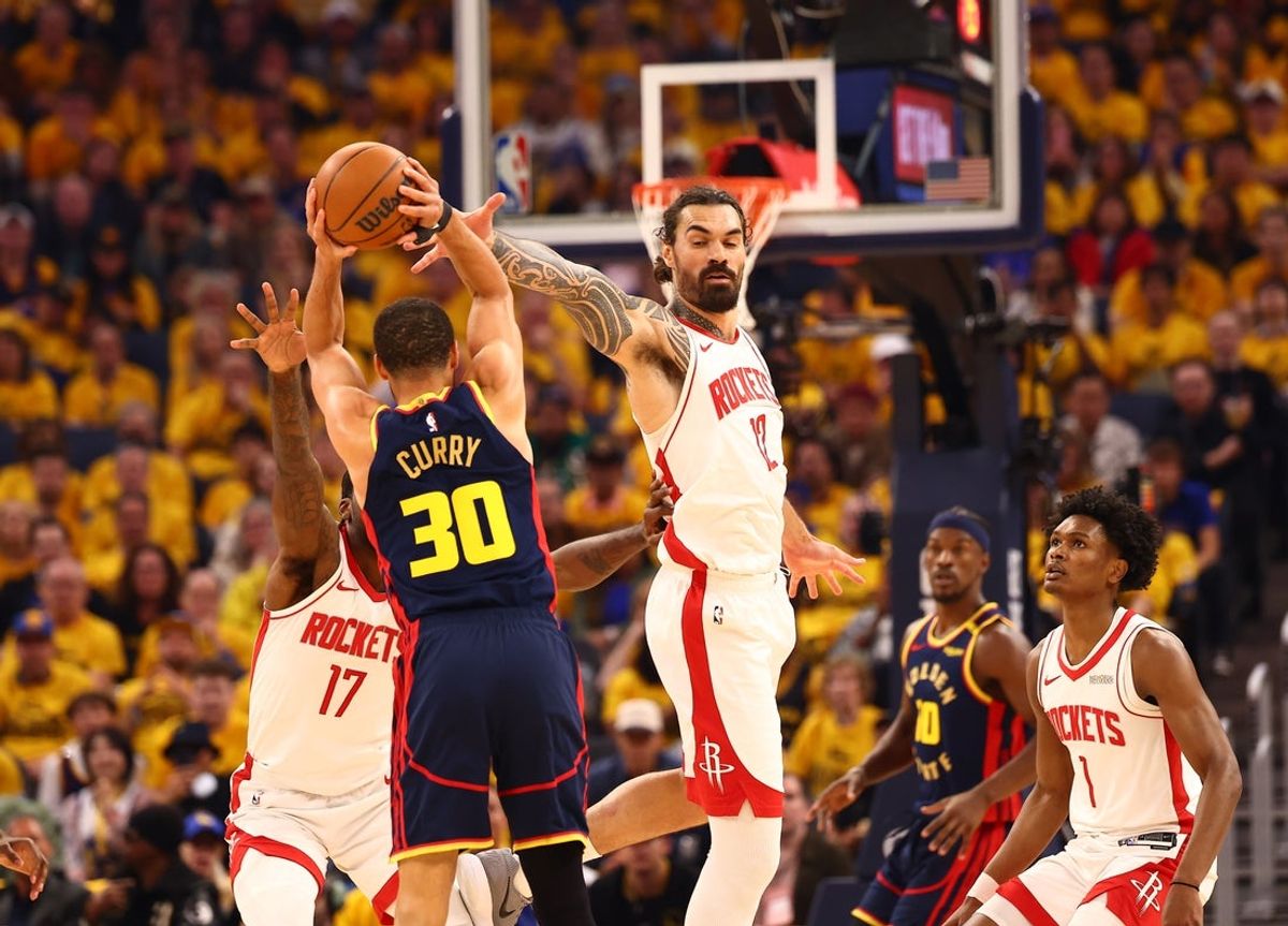 Apr 28, 2025; San Francisco, California, USA; Golden State Warriors guard Stephen Curry (30) controls the ball against Houston Rockets forward Tari Eason (17) and center Steven Adams (12) during the first quarter of game four of the 2025 NBA Playoffs first round at Chase Center. Mandatory Credit: Kelley L Cox-Imagn Images