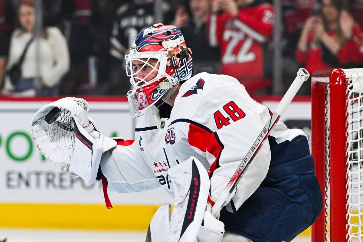 Apr 27, 2025; Montreal, Quebec, CAN;Washington Capitals goalie Logan Thompson (48) takes shots  during warm-up before the game against the Montreal Canadiens in game four of the first round of the 2025 Stanley Cup Playoffs at Bell Centre. Mandatory Credit: David Kirouac-Imagn Images