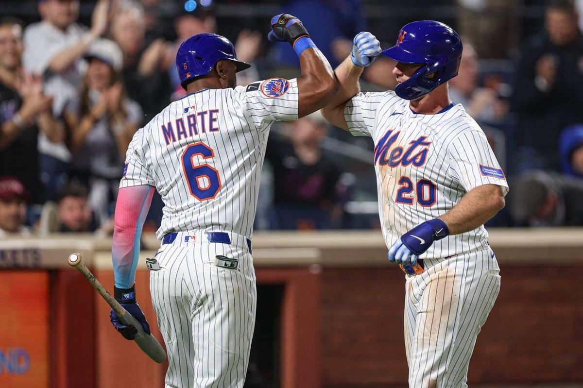 Apr 29, 2025; New York City, New York, USA; New York Mets first baseman Pete Alonso (20) celebrates with designated hitter Starling Marte (6) after hitting a solo home run during the fourth inning against the Arizona Diamondbacks at Citi Field. Mandatory Credit: Vincent Carchietta-Imagn Images