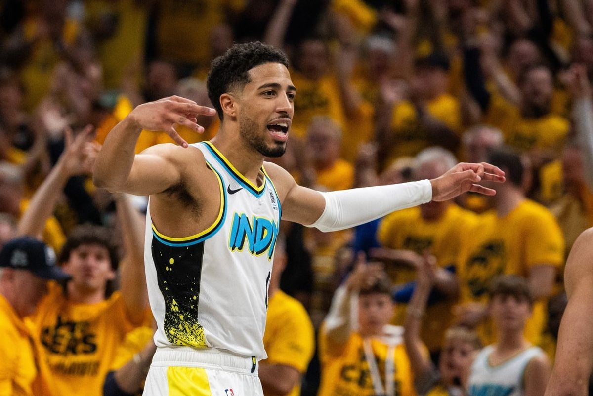 Apr 29, 2025; Indianapolis, Indiana, USA; Indiana Pacers guard Tyrese Haliburton (0) celebrates a made basket during game five of the first round for the 2024 NBA Playoffs against the Milwaukee Bucks  at Gainbridge Fieldhouse. Mandatory Credit: Trevor Ruszkowski-Imagn Images