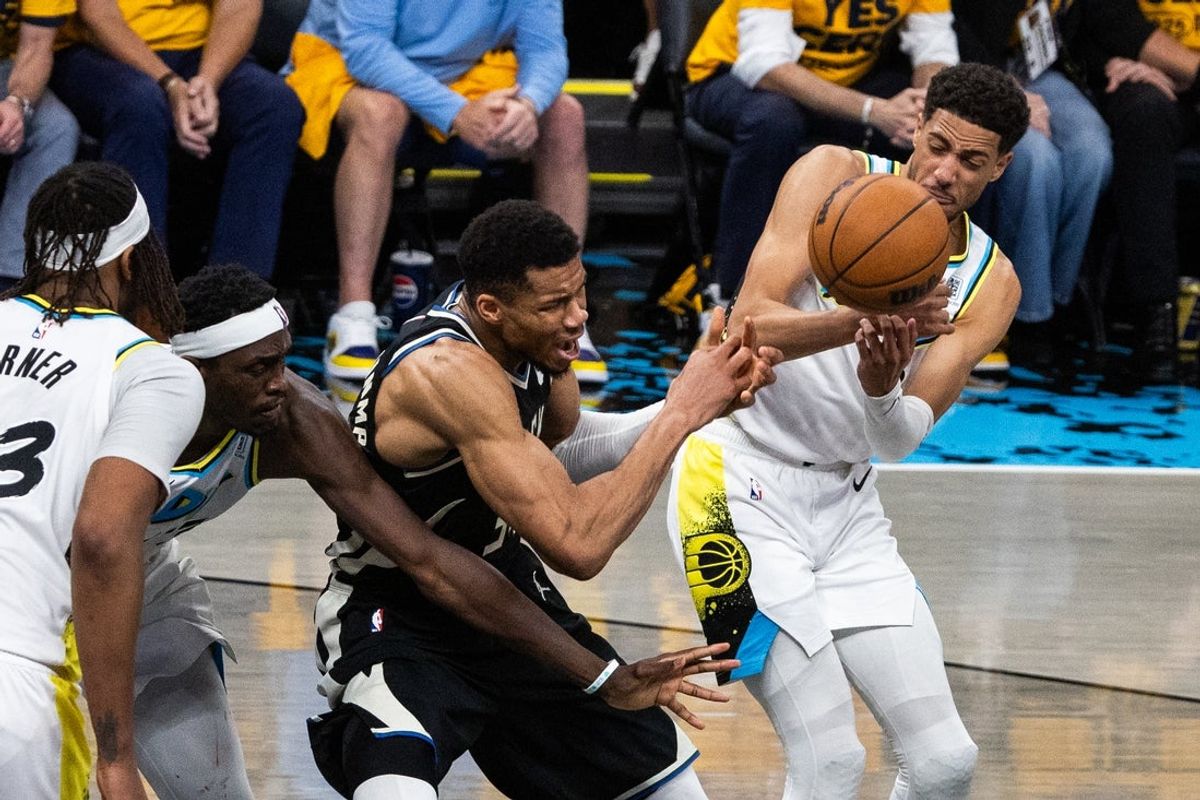 Apr 29, 2025; Indianapolis, Indiana, USA; Indiana Pacers guard Tyrese Haliburton (0) steals the ball from Milwaukee Bucks forward Giannis Antetokounmpo (34) during game five of the first round for the 2024 NBA Playoffs at Gainbridge Fieldhouse. Mandatory Credit: Trevor Ruszkowski-Imagn Images