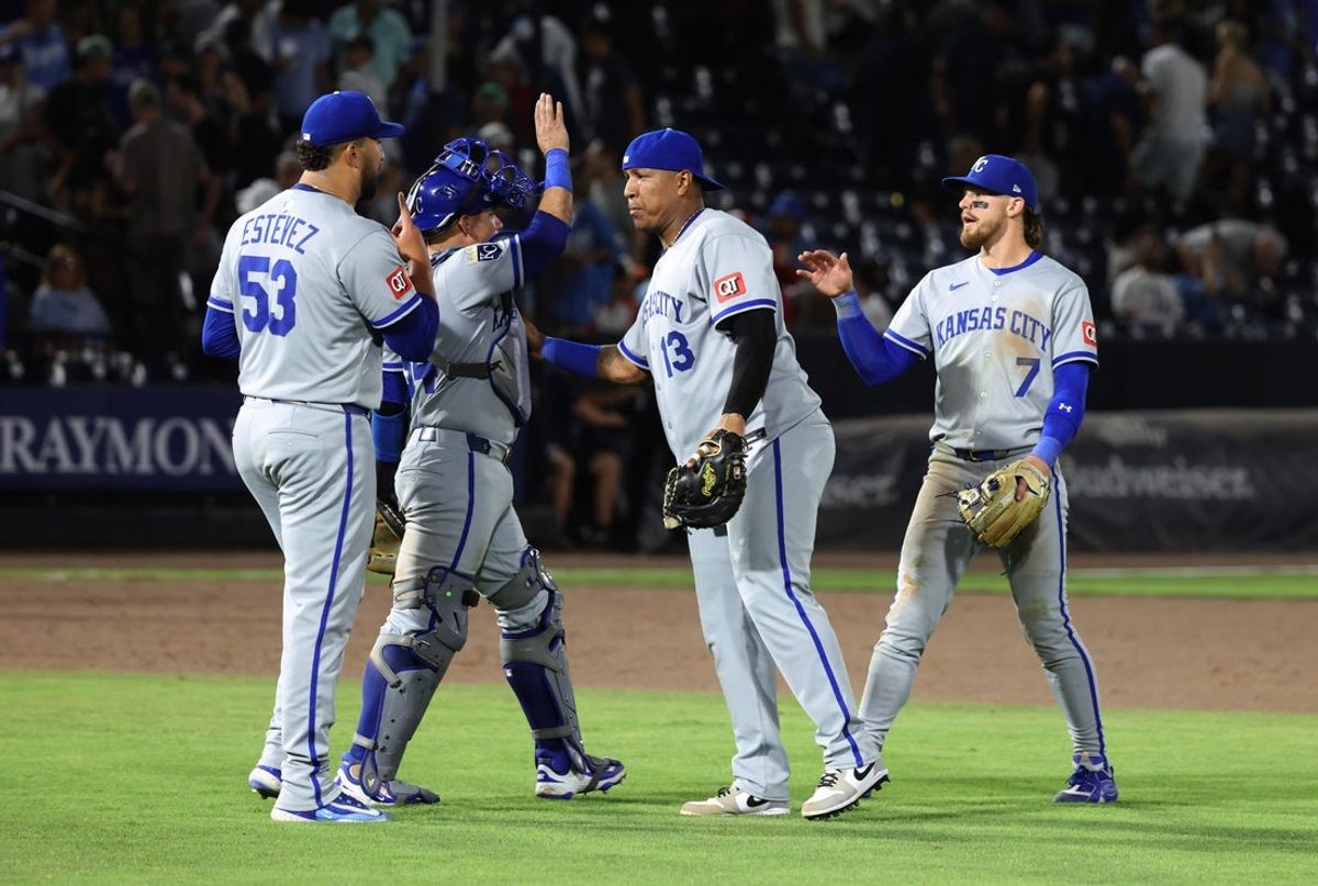 Apr 29, 2025; St. Petersburg, Florida, USA; Kansas City Royals pitcher Carlos Estevez (53), catcher Freddy Fermin (34), first baseman Salvador Perez (13) and shortstop Bobby Witt Jr. (7) celebrate after defeatingt the Tampa Bay Rays at George M. Steinbrenner Field. Mandatory Credit: Kim Klement Neitzel-Imagn Images