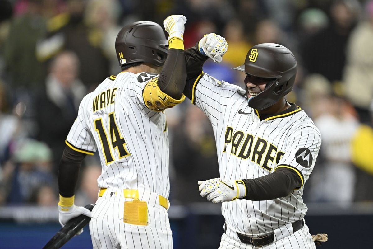Apr 29, 2025; San Diego, California, USA; San Diego Padres shortstop Xander Bogaerts (2) is congratulated by center fielder Tyler Wade (14) after hitting a two-run home run during the seventh inning against the San Francisco Giants at Petco Park. Mandatory Credit: Denis Poroy-Imagn Images