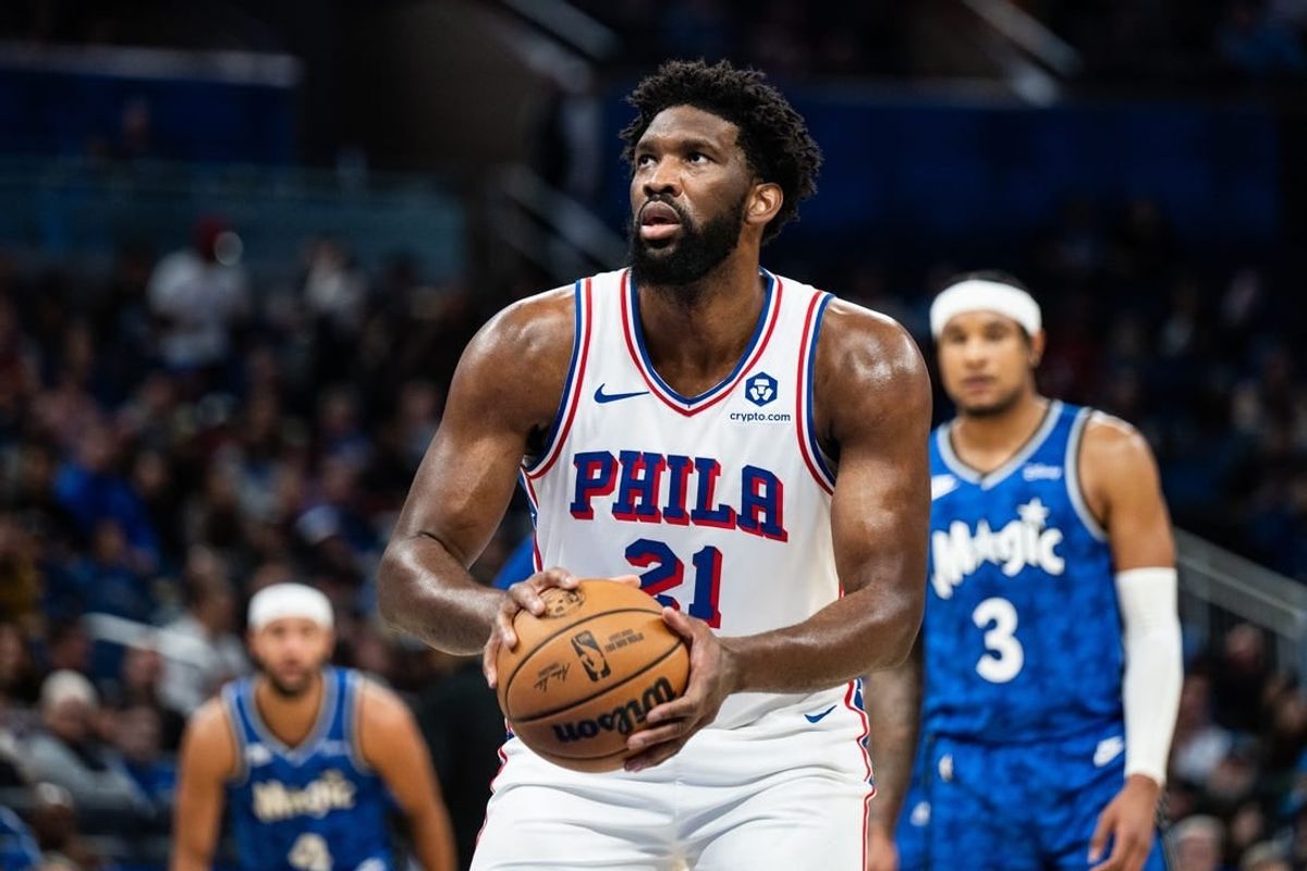 Jan 19, 2024; Orlando, Florida, USA;Philadelphia 76ers center Joel Embiid (21) shoots the technical foul against the Orlando Magic in the first quarter at KIA Center.