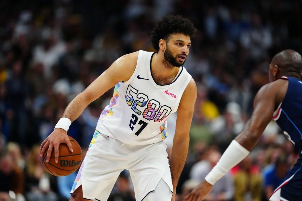 Apr 29, 2025; Denver, Colorado, USA; Denver Nuggets guard Jamal Murray (27) dribbles during the second half against the LA Clippers in game five of the first round for the 2025 NBA Playoffs at Ball Arena. Mandatory Credit: Ron Chenoy-Imagn Images