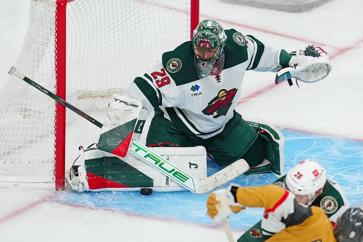 Apr 29, 2025; Las Vegas, Nevada, USA; Minnesota Wild goaltender Marc-Andre Fleury (29) makes a save against the Vegas Golden Knights during an overtime period in game five of the first round of the 2025 Stanley Cup Playoffs at T-Mobile Arena. Mandatory Credit: Stephen R. Sylvanie-Imagn Images