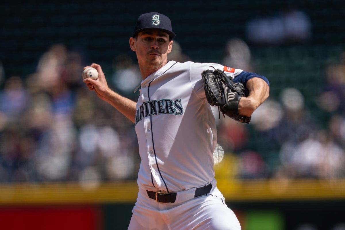 Apr 30, 2025; Seattle, Washington, USA;  Seattle Mariners starter Emerson Hancock (26) delivers a pitch during the third inning against the Los Angeles Angels at T-Mobile Park. Mandatory Credit: Stephen Brashear-Imagn Images