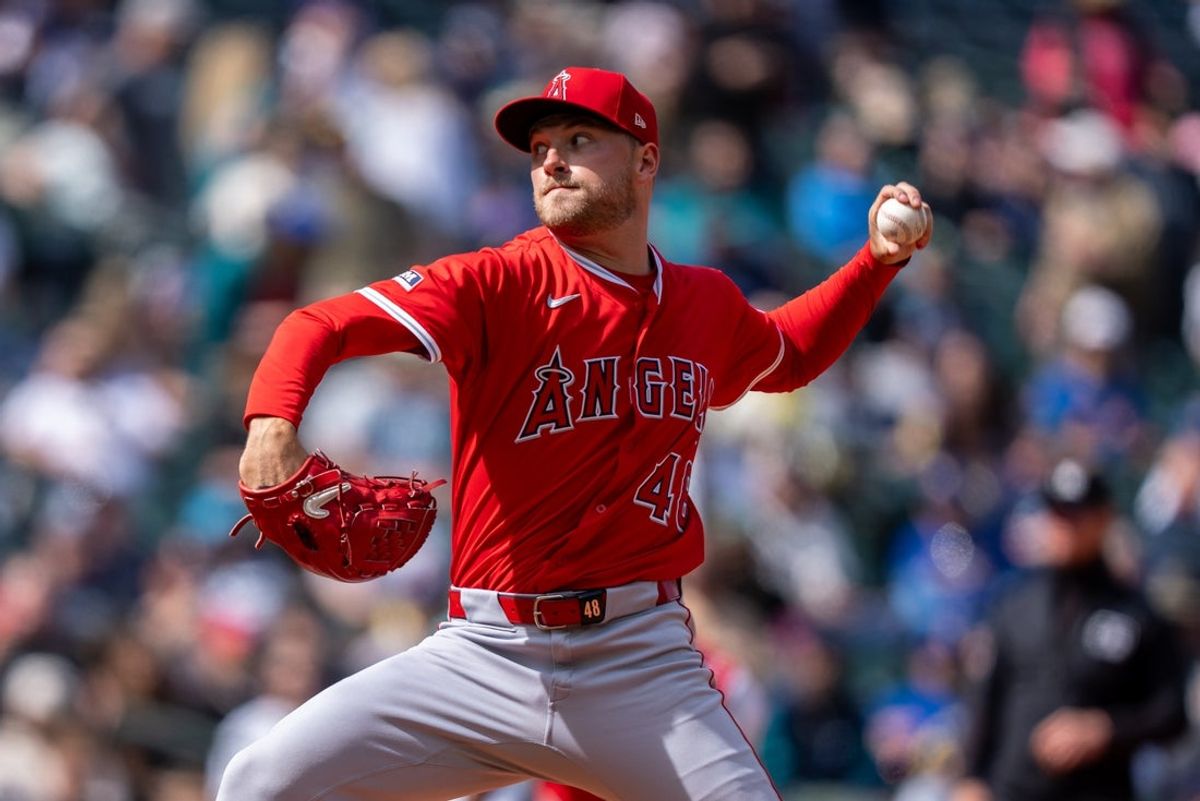 Apr 30, 2025; Seattle, Washington, USA;  Los Angeles Angels reliever Reid Detmers (48) delivers a pitch during the seventh inning against the Seattle Mariners at T-Mobile Park. Mandatory Credit: Stephen Brashear-Imagn Images
