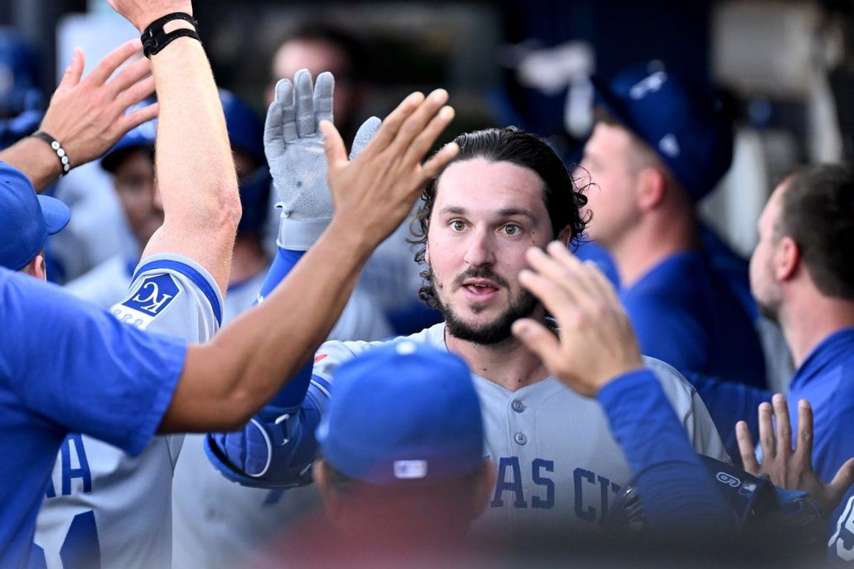 Apr 30, 2025; St. Petersburg, Florida, USA; Kansas City Royals first baseman Vinnie Pasquantino (9) celebrates with his teammates after hitting a two-run home run in the first inning against the Tampa Bay Rays at George M. Steinbrenner Field. Mandatory Credit: Jonathan Dyer-Imagn Images