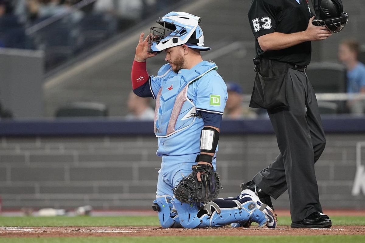 Apr 30, 2025; Toronto, Ontario, CAN; Toronto Blue Jays catcher Alejandro Kirk (30) reacts after a solo home run by Boston Red Sox third baseman Alex Bregman (not pictured) during the first inning at Rogers Centre. Mandatory Credit: John E. Sokolowski-Imagn Images
