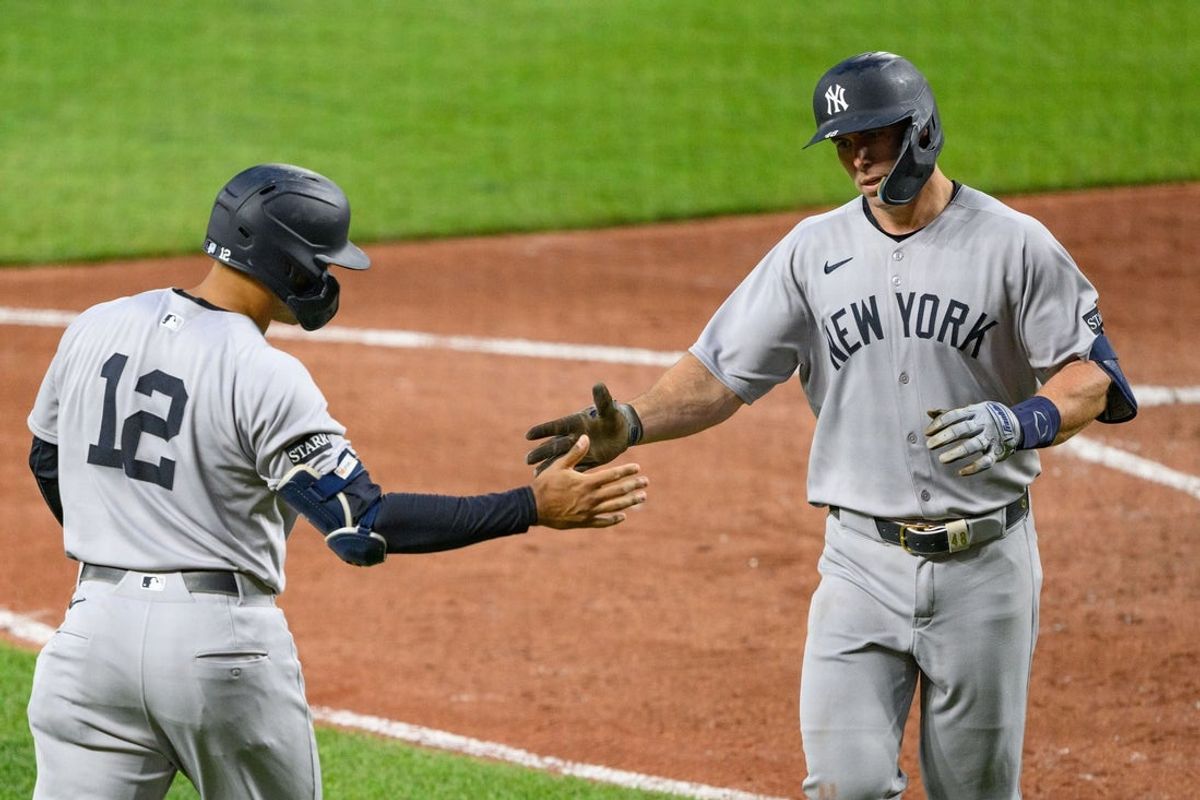Apr 30, 2025; Baltimore, Maryland, USA; New York Yankees first baseman Paul Goldschmidt (48) celebrates with outfielder Trent Grisham (12) after hitting a home run during the fifth inning against the Baltimore Orioles at Oriole Park at Camden Yards. Mandatory Credit: Reggie Hildred-Imagn Images