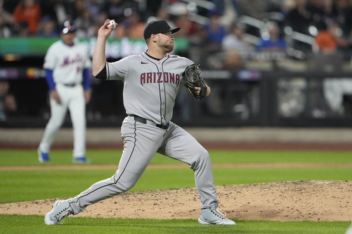 Apr 30, 2025; New York City, New York, USA; Arizona Diamondbacks pitcher Corbin Burnes (39) throws to second base for a force out after fielding a ground ball hit by New York Mets right fielder Juan Soto (22) (not pictured) during the fifth inning at Citi Field. Mandatory Credit: Gregory Fisher-Imagn Images