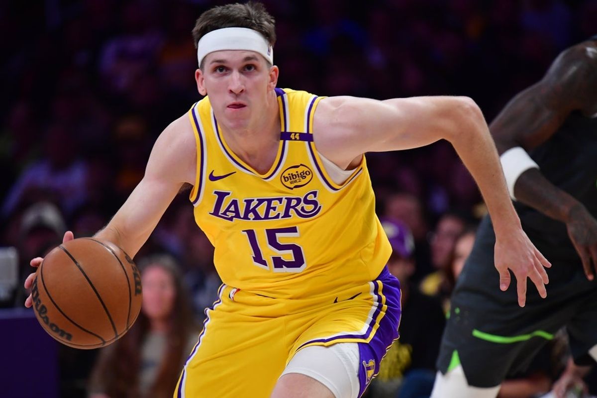 Apr 30, 2025; Los Angeles, California, USA; Los Angeles Lakers guard Austin Reaves (15) moves to the basket against the Minnesota Timberwolves during the first half in game five of first round for the 2025 NBA Playoffs at Crypto.com Arena. Mandatory Credit: Gary A. Vasquez-Imagn Images