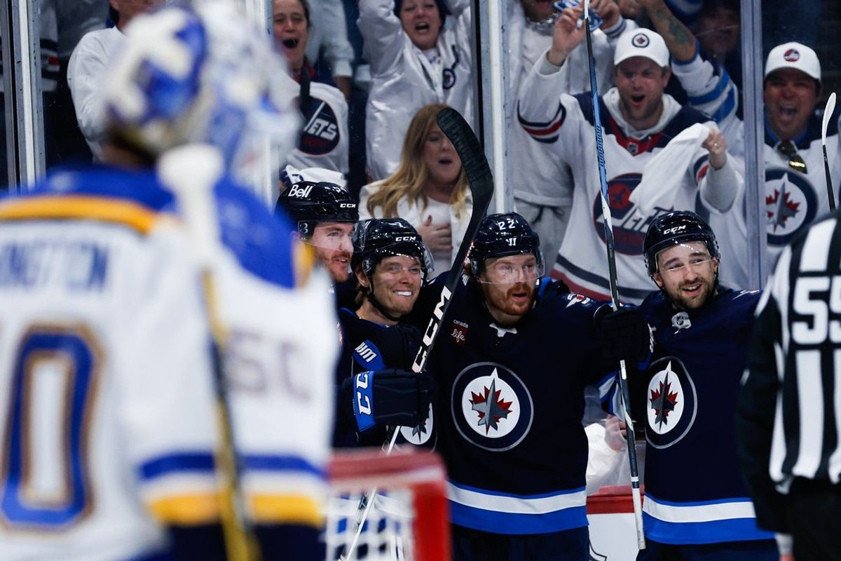 Apr 30, 2025; Winnipeg, Manitoba, CAN; Winnipeg Jets forward Vladislav Namestnikov (7) is congratulated by his teammates on his goal against the St. Louis Blues during the second period in game five of the first round of the 2025 Stanley Cup Playoffs at Canada Life Centre. Mandatory Credit: Terrence Lee-Imagn Images