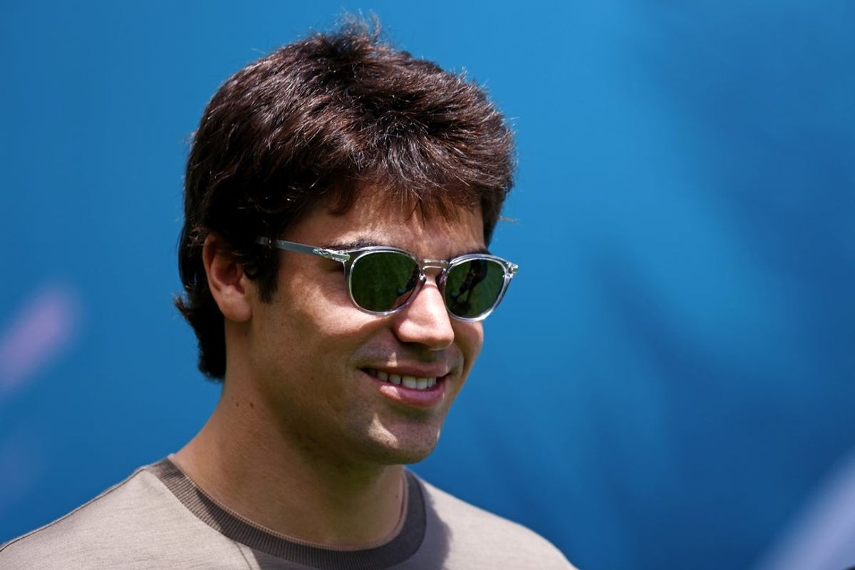 May 1, 2025; Miami Gardens, FL, USA; Aston Martin driver Lance Stroll (18) walks in the paddack ahead of the F1 Miami Grand Prix at Miami International Autodrome. Mandatory Credit: Peter Casey-Imagn Images