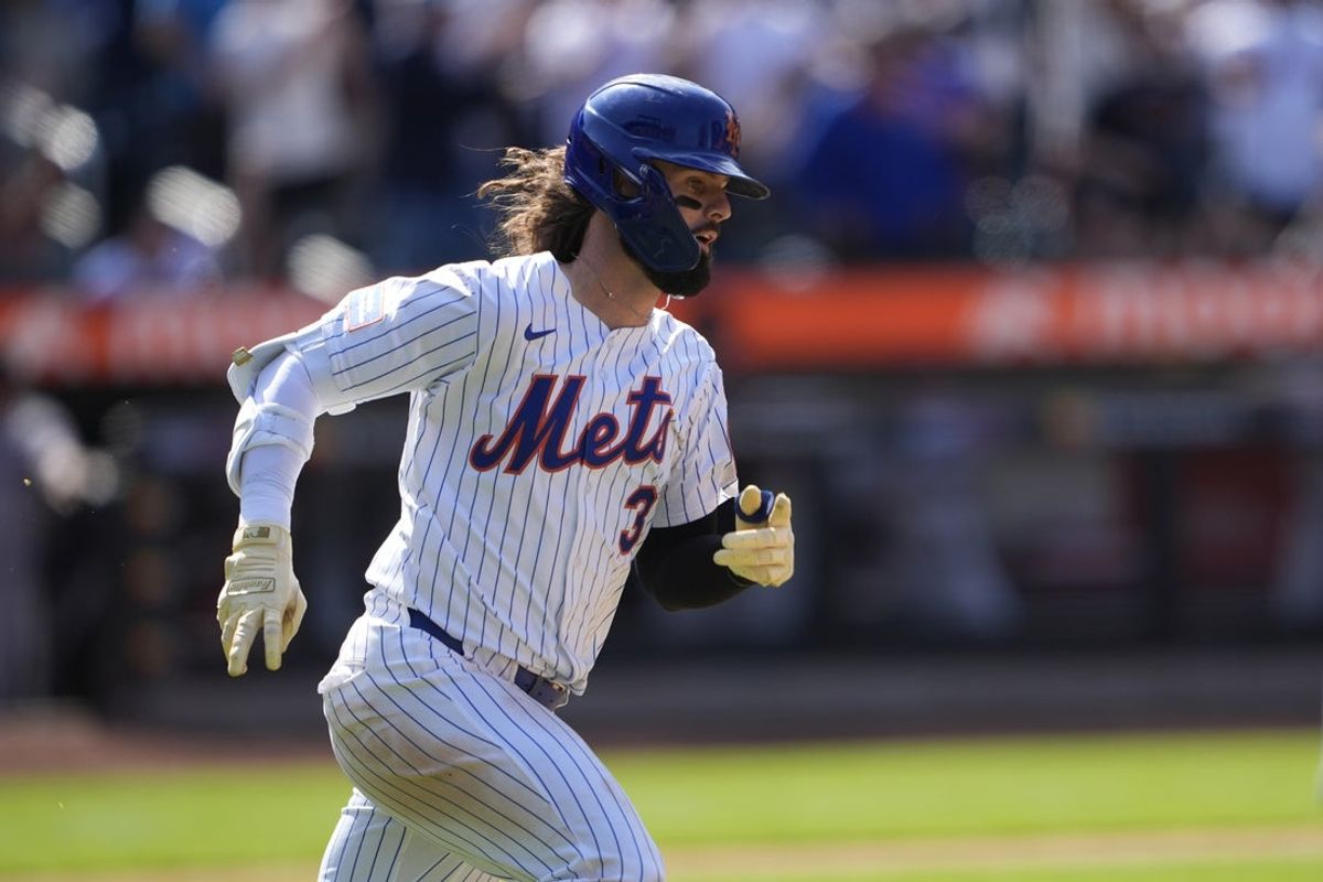 May 1, 2025; New York City, New York, USA; New York Mets designated hitter Jesse Winker (3) runs out a double against the Arizona Diamondbacks during the eighth inning at Citi Field. Mandatory Credit: Gregory Fisher-Imagn Images