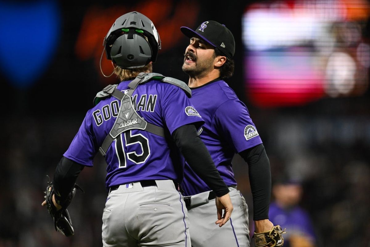 May 1, 2025; San Francisco, California, USA; Colorado Rockies pitcher Zachary Agnos (36) celebrates with catcher Hunter Goodman (15) after their win over the San Francisco Giants in the ninth inning at Oracle Park. Mandatory Credit: Eakin Howard-Imagn Images